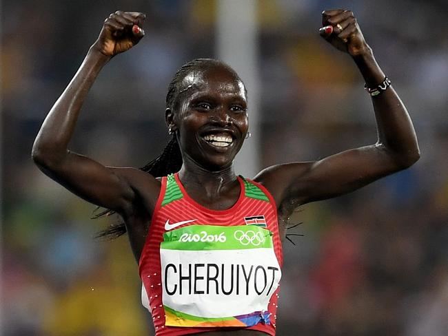 Vivian Jepkemoi Cheruiyot of Kenya celebrates winning the Women's 5000m.