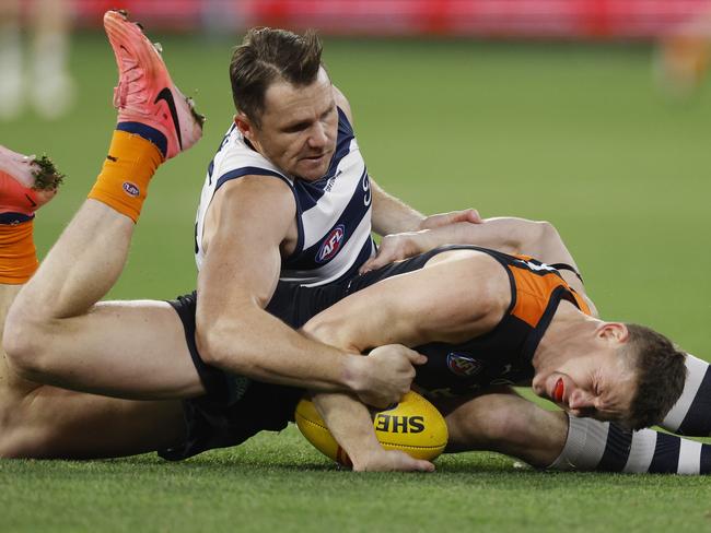 MELBOURNE, AUSTRALIAÃ June 21 , 2024.  AFL Round 15. Carlton vs Geelong at the MCG.   Sam Walsh of the Blues  gets tackled into the turf by Patrick Dangerfield of the Cats during the 1st qtr.     . Pic: Michael Klein