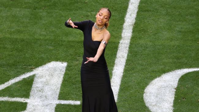 Justina Miles performing "Lift Every Voice and Sing" in American Sign Language. Picture: Rob Carr/Getty Images/AFP