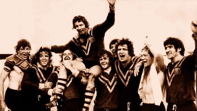 Australia captain Graeme Langlands is chaired off after a Test against Great Britain.