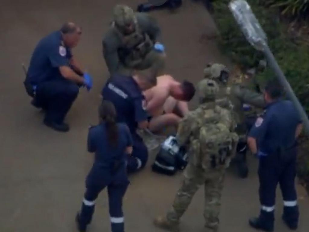 The 26-year-old man was arrested after allegedly firing shots at police. Picture: 7News