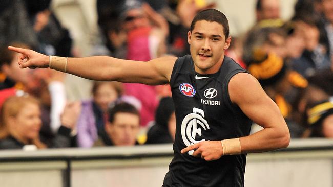 Shaun Grigg celebrates a goal during the early years of his career at Carlton.