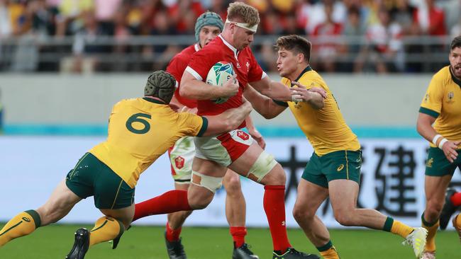 David Pocock and James O’Connor combine for a tackle against Wales. Picture: Getty Images