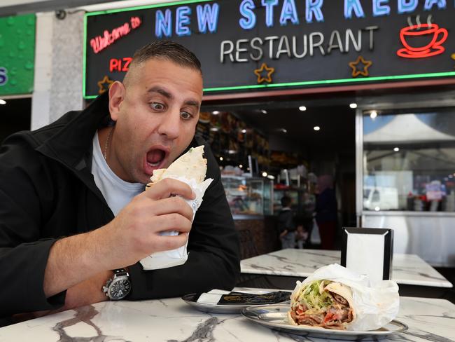 Rob Shehadie taste testing the kebabs at New Star Kebabs. Picture: Jonathan Ng