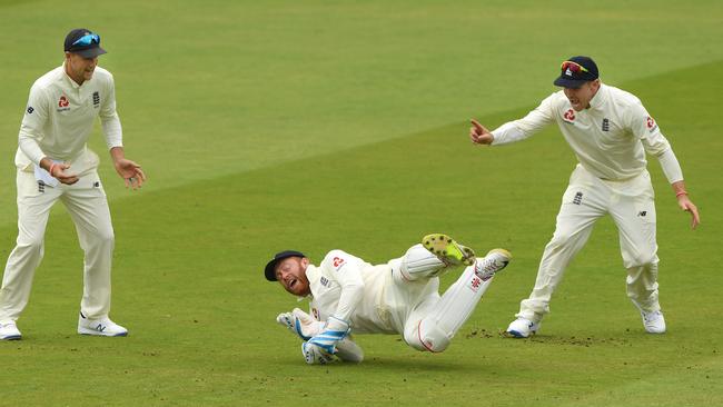 England wicketkeeper Jonny Bairstow (c) celebrates with Joe Root and Jason Roy after catching William Porterfield. Picture: Stu Forster/Getty Images