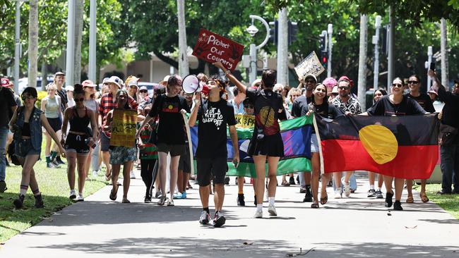 Event organiser Manny Williams leads the Invasion Day rally protest march along the Esplanade on Australia Day. Picture: Brendan Radke