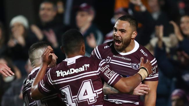 Dylan Walker of the Sea Eagles celebrates with team mates after scoring a try during the Round 22 NRL match between the Manly Sea Eagles and the Wests Tigers at Lottoland in Sydney, Thursday, August 15, 2019. (AAP Image/Brendon Thorne) NO ARCHIVING, EDITORIAL USE ONLY