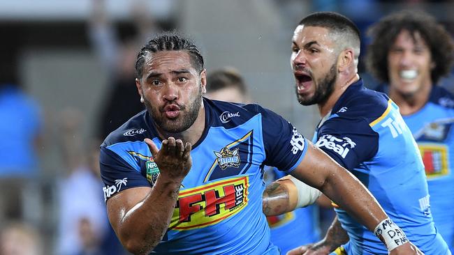 Konrad Hurrell of the Titans reacts after winning try during the Round 1 NRL match between the Gold Coast Titans and the Canberra Raiders at Cbus Super Stadium in Robina on the Gold Coast, Sunday, March 11, 2018. (AAP Image/Dave Hunt) NO ARCHIVING, EDITORIAL USE ONLY