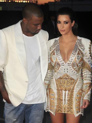 A loving stare: Kanye West and Kim Kardashian attend the ‘Cruel Summer’ presentation during the 65th Annual Cannes Film Festival on May 23, 2012 in Cannes, France. Picture: Splash