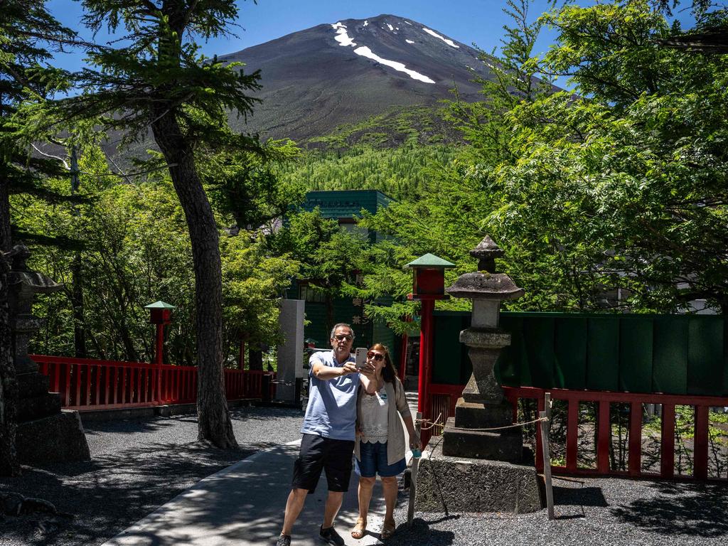 A mandatory 2,000 yen ($19) climbing fee has been introduced at Mount Fuji. Picture: Philip FONG / AFP