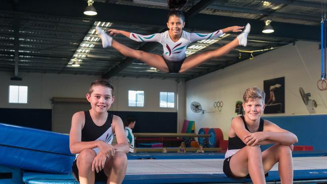 Liam Richards, 11, Lacey Hema, 9, and Rhys Mulholland, 13 from the Varsity Lakes Trampoline and Gymnastics Club, which has seen its membership surge in the wake of the Commonwealth Games.