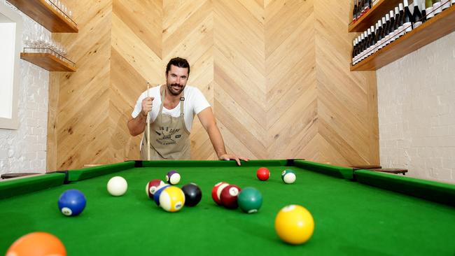 Co-owner George McLean at the pool table.