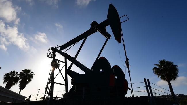 An oil pump jack in California, Donald Trump has ordered his administration to come up with a plan to aid US oil companies struggling with a massive supply glut and record-low crude prices. Picture: AFP