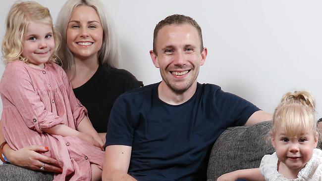 Paul and Hayley Abbey with their daughters Sadie(left) and Lottie(right). Picture: Ian Currie