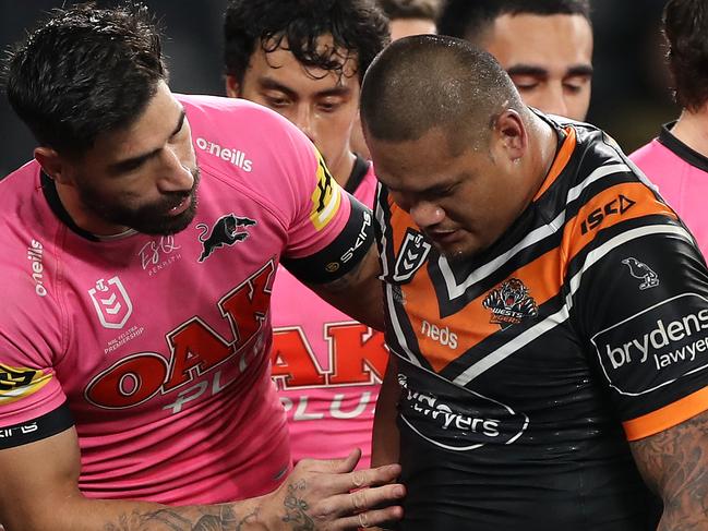 SYDNEY, AUSTRALIA - JULY 04: James Tamou of the Panthers speaks to Joseph Leilua of the Tigers following a high tackle on his brother Luciano Leilua of the Tigers during the round eight NRL match between the Wests Tigers and the Penrith Panthers at Bankwest Stadium on July 04, 2020 in Sydney, Australia. (Photo by Mark Kolbe/Getty Images)