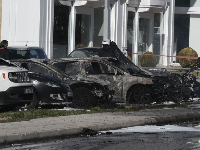 The burnout car in an Athens parking lot. Picture: Supplied, News Corp