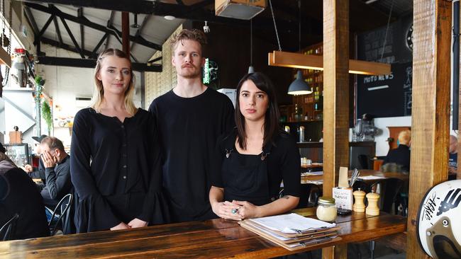 Cafe Moto in Carrum has been struggling to keep afloat with level crossing removal works nearby and is now shutting. Staff Sian Jones, Miles Duggan and Julia Levis are devastated. Picture: Josie Hayden