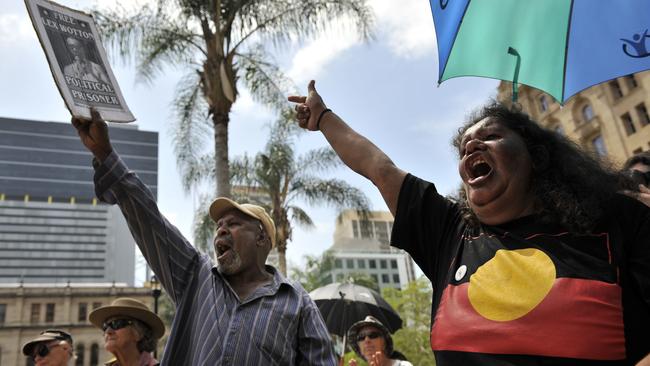 Protesters against the jailing of Palm Island resident Lex Wotton march to Parliament House in Brisbane in 2008. Picture: AAP