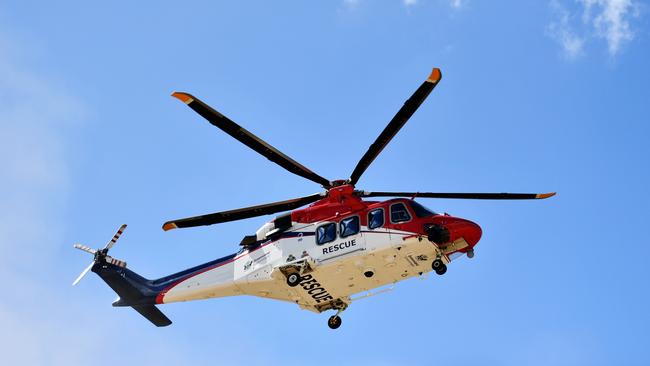 The QGAir helicopter circled Townsville on Monday tracking car thieves. Picture: Alix Sweeney