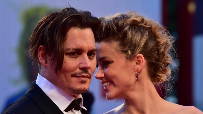 Johnny Depp and Amber Heard in happier times. Picture: AFP