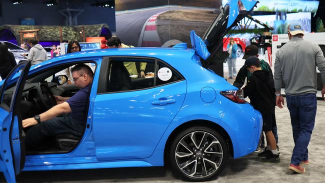 People look at the Toyota Corolla Hatchback a the New York International Auto Show. Picture: Getty Images/AFP