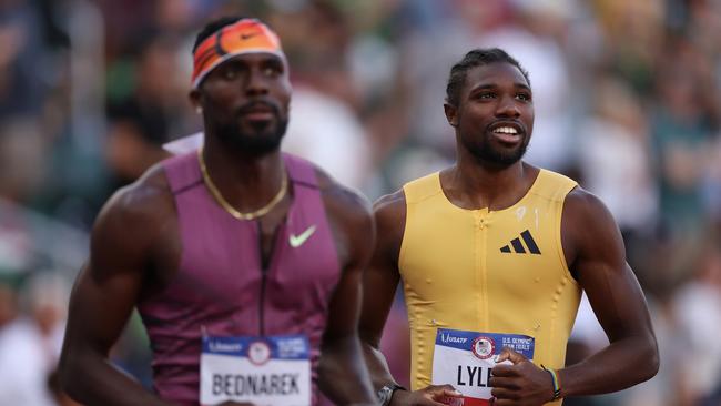 EUGENE, OREGON - JUNE 30:  Noah Lyles (R) and Kenny Bednarek react after finishing the men's 200 meter final on Day Nine of the 2024 U.S. Olympic Team Track & Field Trials on June 29, 2024 in Eugene, Oregon. (Photo by Christian Petersen/Getty Images)