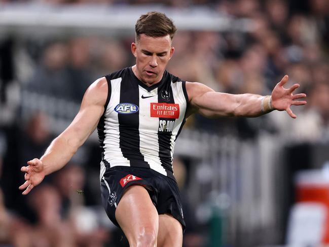 Jack Bytel gets away a kick for Collingwood. Picture: Mark Stewart