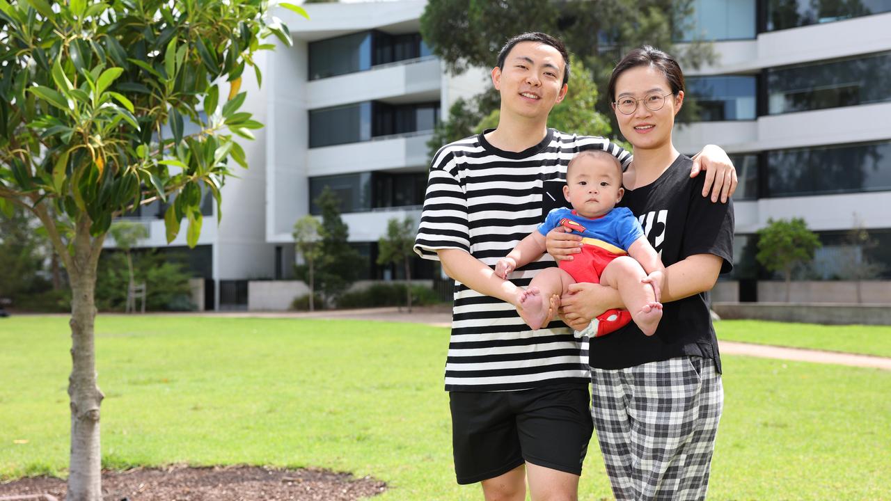 Roger and Lily Yang with their baby Casper selling their property to upgrade. Picture: Ted Lamb