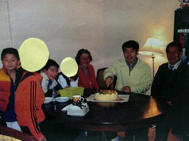 Playing happy families: From left, Irene Lin, Terry Lin, Henry Lin, Feng Qing Zhu, Min Lin and Yang Fei Lin.