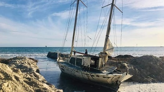 Attempts by the owner to get this stranded yacht off the beach at North Haven have failed. Picture: Supplied