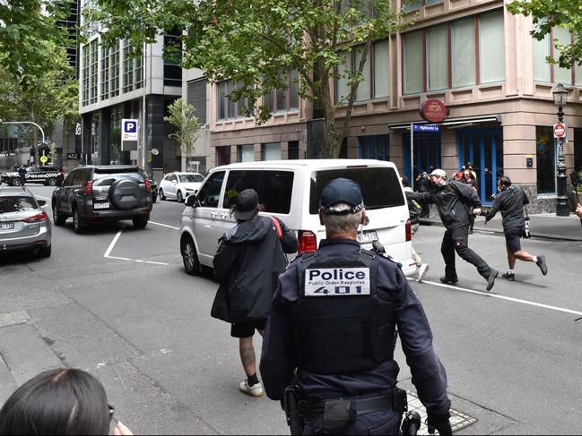 Two Australian Border Force vehicles leave a car park, reportedly taking Novak Djokovic back to a Melbourne detention hotel. Picture: Paul Crock / AFP