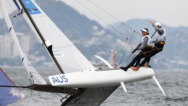 Jason Waterhouse and Lisa Darmanin celebrate winning the silver medal in the Nacra 17 mixed class.