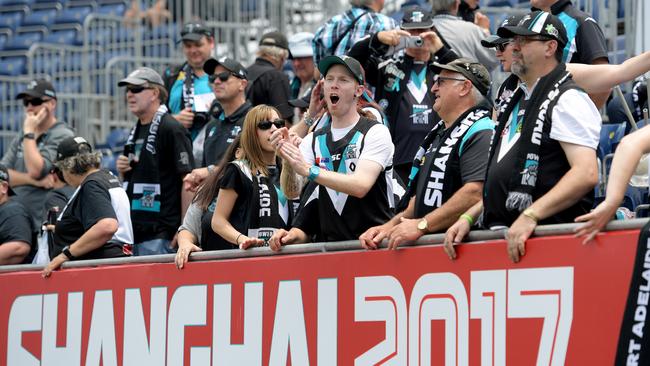 Port Adelaide fans get ready for the match against the Suns. Picture: AAP