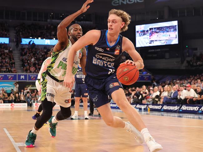 Luke Travers of United handles the ball during the round 1 match between Melbourne United and South East Melbourne Phoenix. Picture: Getty Images