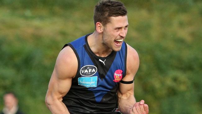 Kieran Harper celebrates a goal for Uni Blues in last year’s grand final. Picture: Hamish Blair