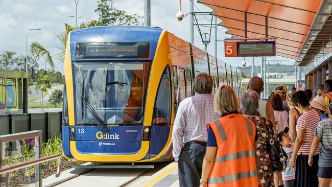 The crowds wait as the light rail tram enters the station at Helensvale. Picture: Jerad Williams