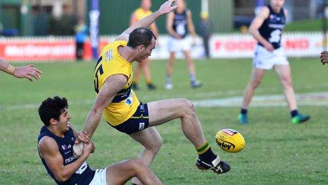 One of the few times the Panthers got a hand on the Eagles in the second half at Woodville Oval. Picture: Keryn Stevens/AAP