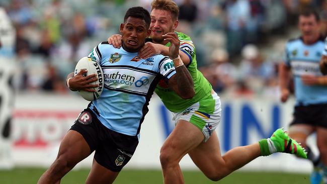 CANBERRA, AUSTRALIA - APRIL 17: Ben Barba of the Sharks is tackled by Elliott Whitehead of the Raiders during the round seven NRL match between the Canberra Raiders and the Cronulla Sharks at GIO Stadium on April 17, 2016 in Canberra, Australia. (Photo by Renee McKay/Getty Images)