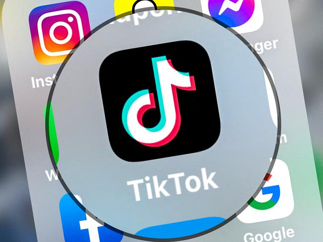 (FILES) This file photograph taken on March 23, 2022, shows logo of the networking application TikToK displayed on a tablet in Lille, northern France. - TikTok on Monday said it will start letting some popular accounts at the video-snippet streaming star charge subscriptions for live streams. Similar money-making tools have been added to rivals such as Instagram and Facebook as the social media platforms compete for online personalities that attract audiences. (Photo by DENIS CHARLET / AFP)