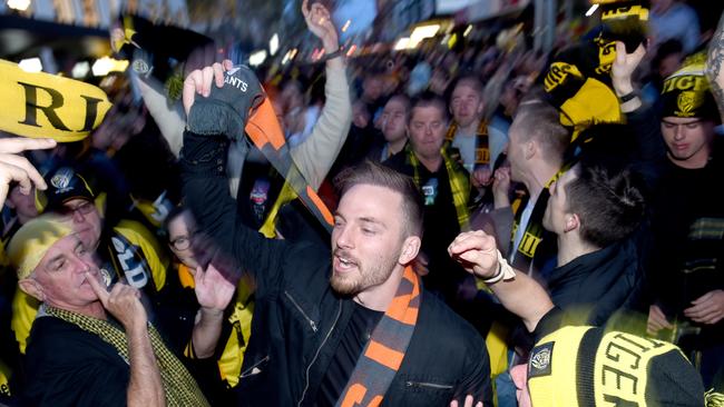 Defiant GWS fans party on Swan Street, despite the Tigers taking home the flag. Picture: Tony Gough