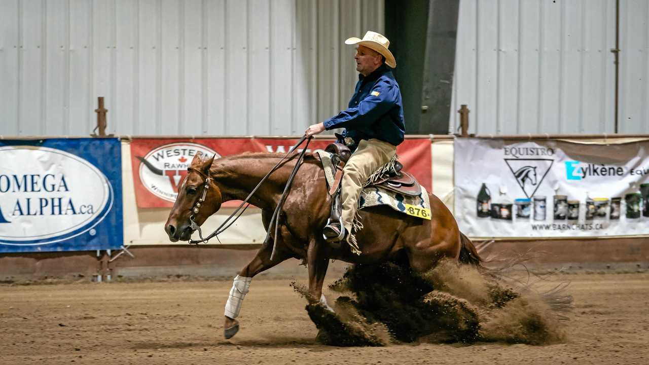 WORLD CLASS: Lockyer Valley rider Ben O'Sullivan and Hang Ten to Yuma perform a sliding stop during the 2018 Reining Alberta Spring Classic in Canada. O'Sullivan's score at the event secured his place at the World Equestrian Games, where he will represent Ireland. Picture: Contributed