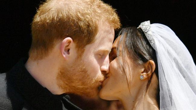 Their first kiss was proof Meghan runs the show. Picture: Mega