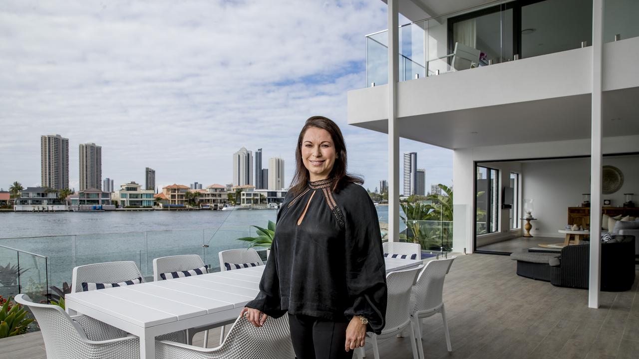 Nicole Bricknell at the outdoor dining area of the stunning home. Picture: Jerad Williams.