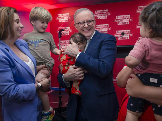 BRISBANE, AUSTRALIA - NewsWire Photos - DECEMBER 11, 2024:The Prime Minister Anthony Albanese holds baby Maise 3 months after delivering  a speech at the Morningside Panthers AFL club in Brisbane.Picture: NewsWire / Glenn Campbell