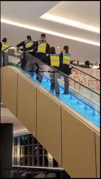 Pro-Palestinian activists protest at Melbourne hotel where Israeli families were staying