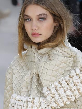 Model Gigi Hadid wears a creation as part of Chanel's Fall-winter 2016-2017 ready to wear collection presented in Paris, France, Tuesday, March 8, 2016. (AP Photo/Francois Mori)