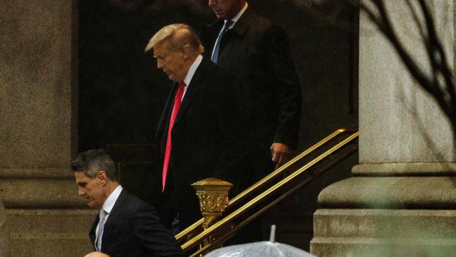 Former US president Donald Trump departs Washington’s Waldorf Astoria hotel where he held a press conference following his appearance in court on Wednesday (AEDT). Picture: Getty Images