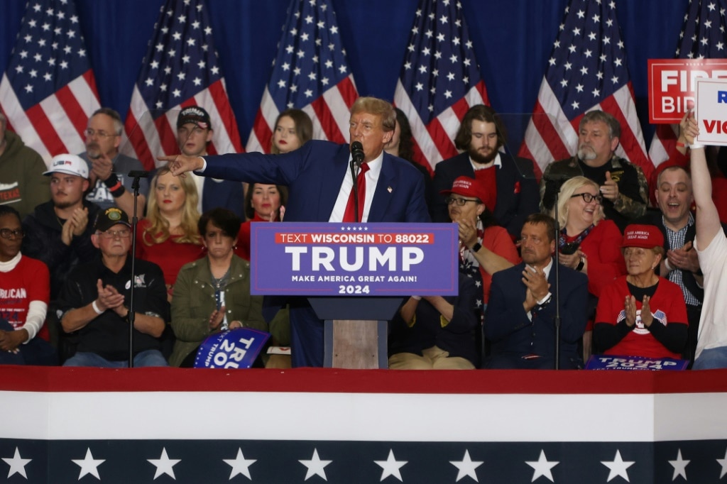 Former US President and 2024 presidential hopeful Donald Trump speaks during a campaign rally at the Hyatt Regency in Green Bay, Wisconsin, on April 2, 2024