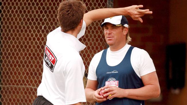 Cricketer Shane Warne (r) with Cullen Bailey at training nets at Adelaide Oval in October, 2006.