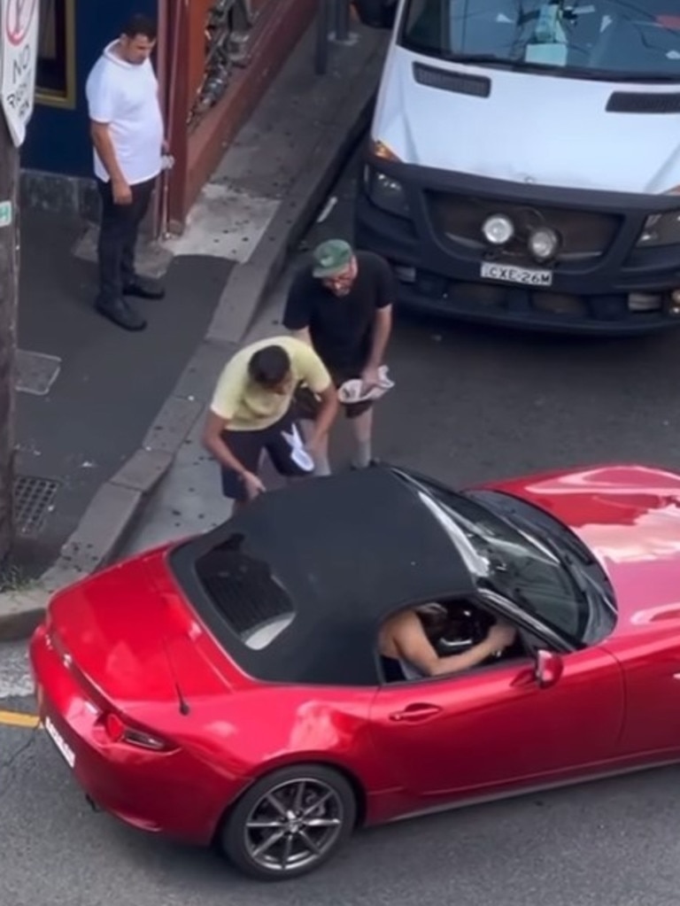 A red convertible driver attempting to enter Elizabeth St from King St in Newtown has gone viral. Picture: Facebook/ Humans of Bankstown